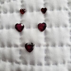 Garnets. A Parcel Of 5 Deep Red Heart Shaped Faceted Garnets.
